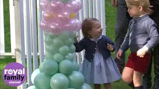 Prince George and Princess Charlotte play with balloons and pet animals