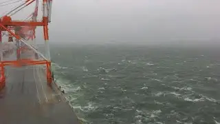 View from Japans Kobe port as typhoon Lan moves inland | AFP