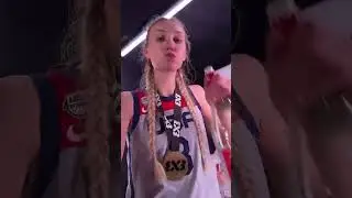 Cameron Brink wearing her World Cup gold medal