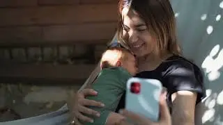 Mother Taking Selfie While Holds Baby In Arms || Copyright free vedios || no copyright footage