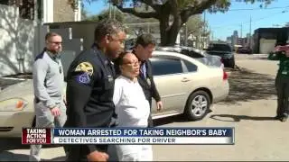 Woman arrested for taking neighbors baby