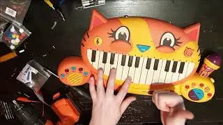 Kitty Cat Keyboard: Adding an output jack and jamming on the B. Meowsic toy keyboard.