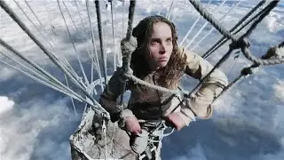 The hot air balloon flies high above the cold, will they make it back to the ground.