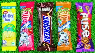 Satisfying video Asmr lollipops candy and chocolate gummy candy unboxing video Asmr.