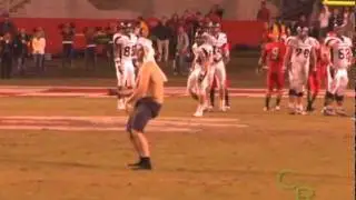 Fan runs on field during game