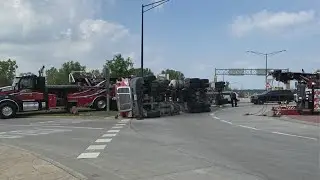 Semi carrying cement tipped on its side at Lineville Road roundabout in Howard