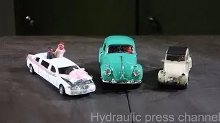 Crushing toy cars with hydraulic press