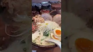 ordering ramen from a vending machine in japan