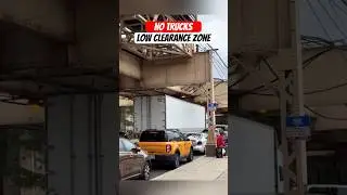 Two trucks ignore low clearance zones in Chicago Illinois