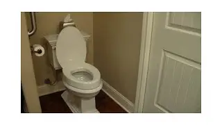 KOHLER  3 inch raised toilet seat