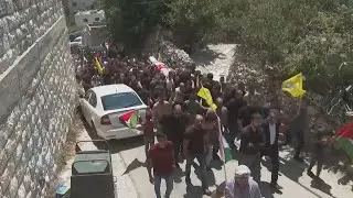 Hundreds attend funeral of Palestinian killed during rampage by Israeli settlers in West Bank