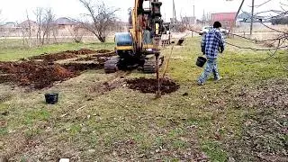 Первый этап фундамента. Бурение под сваи.